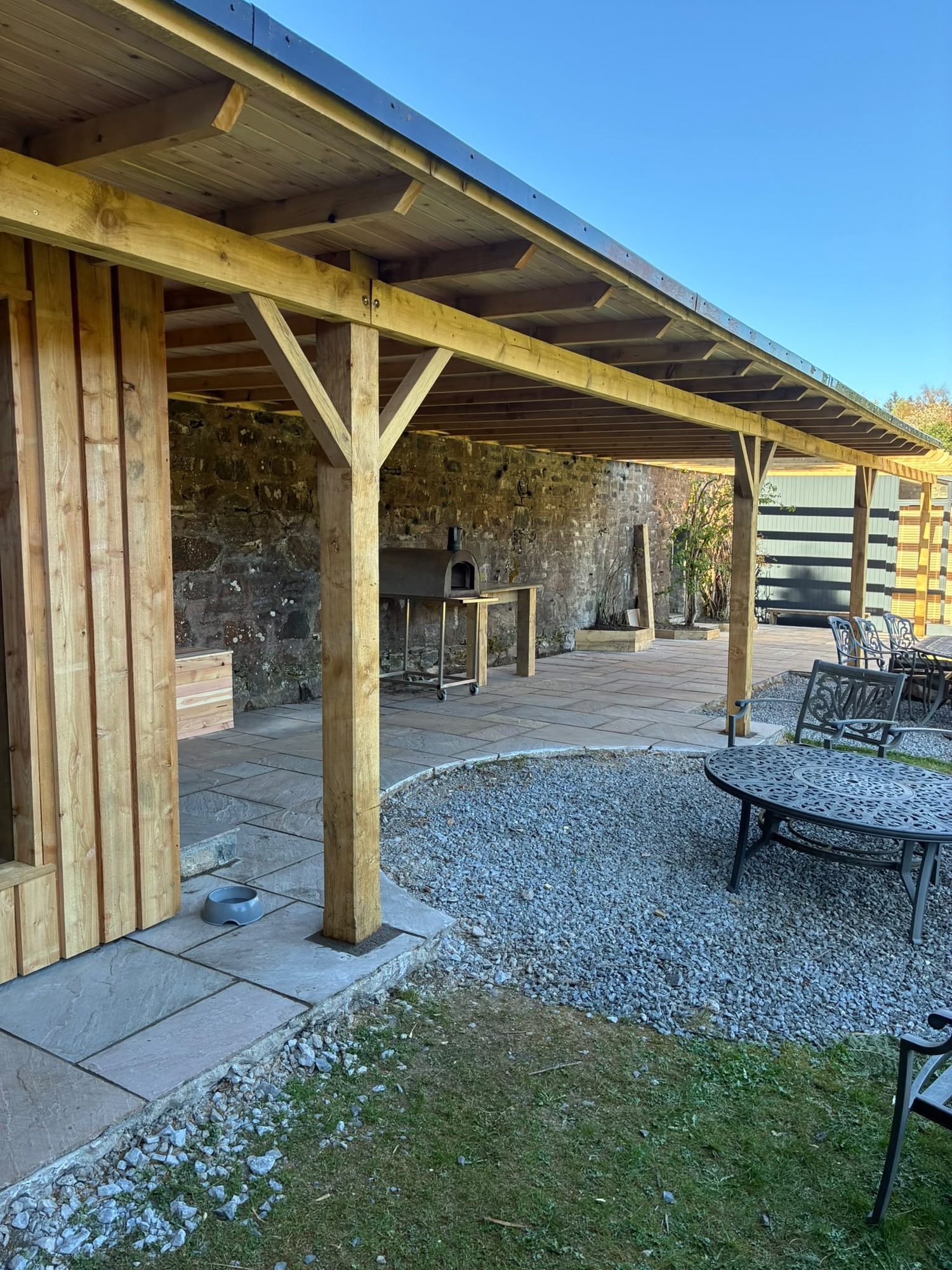 Timber-frame covered patio built by our joiners